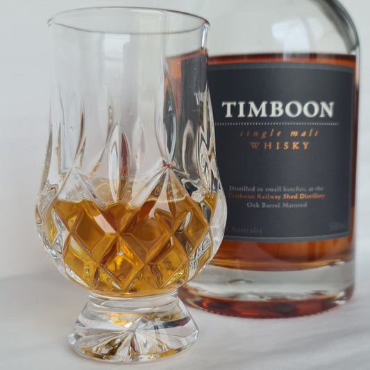 Diamond cut crystal nosing glass with Timboon whiskey bottle
